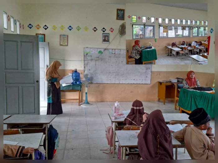 Guru Piket Elia, S.Pd. Cek Kehadiran Siswa, Kepala Madrasah Beri Dukungan