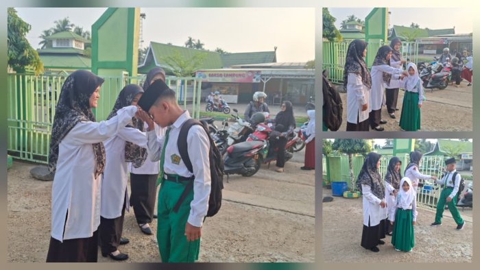 Guru MIN 4 Batang Hari Sambut Hangat Kedatangan Siswa di Gerbang Madrasah Guru MIN 4 Batang Hari Sambut Hangat Kedatangan Siswa di Gerbang Madrasah