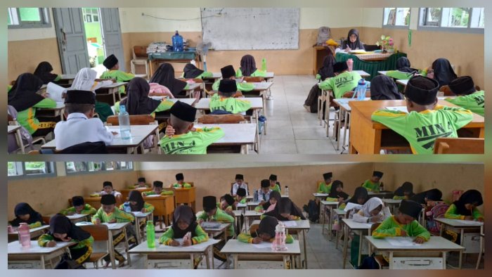 Ibu Siti Muslikah, S.Pd.I. Awasi Ujian SBdP di Ruang Kelas IB
