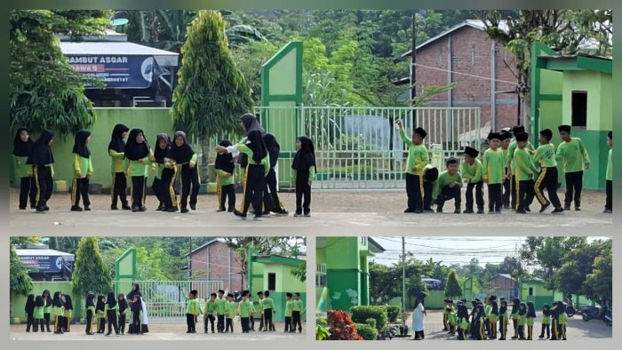 Siswa Kelas I A Belajar PJOK di Halaman Madrasah dengan Penuh Semangat Siswa Kelas I A Belajar PJOK di Halaman Madrasah dengan Penuh Semangat